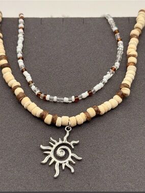 Sea Layered Beaded Necklace with Silver Sun Charm in Cream & Brown